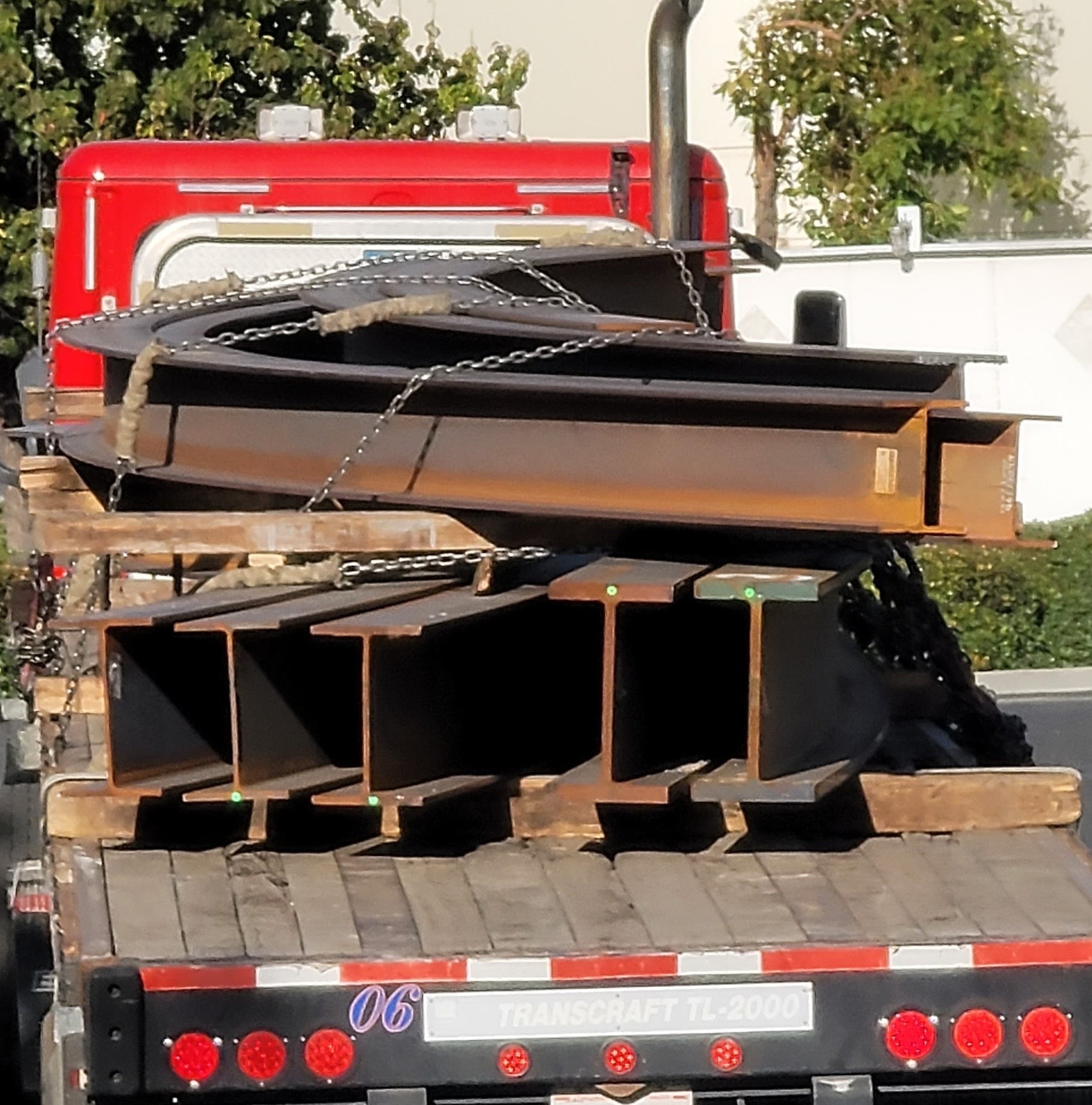 Rolled structural steel beams loaded for delivery from Pacific Roll